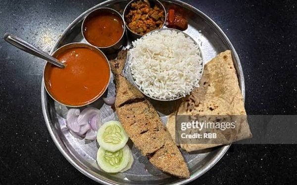 fish rice plate in goan style.